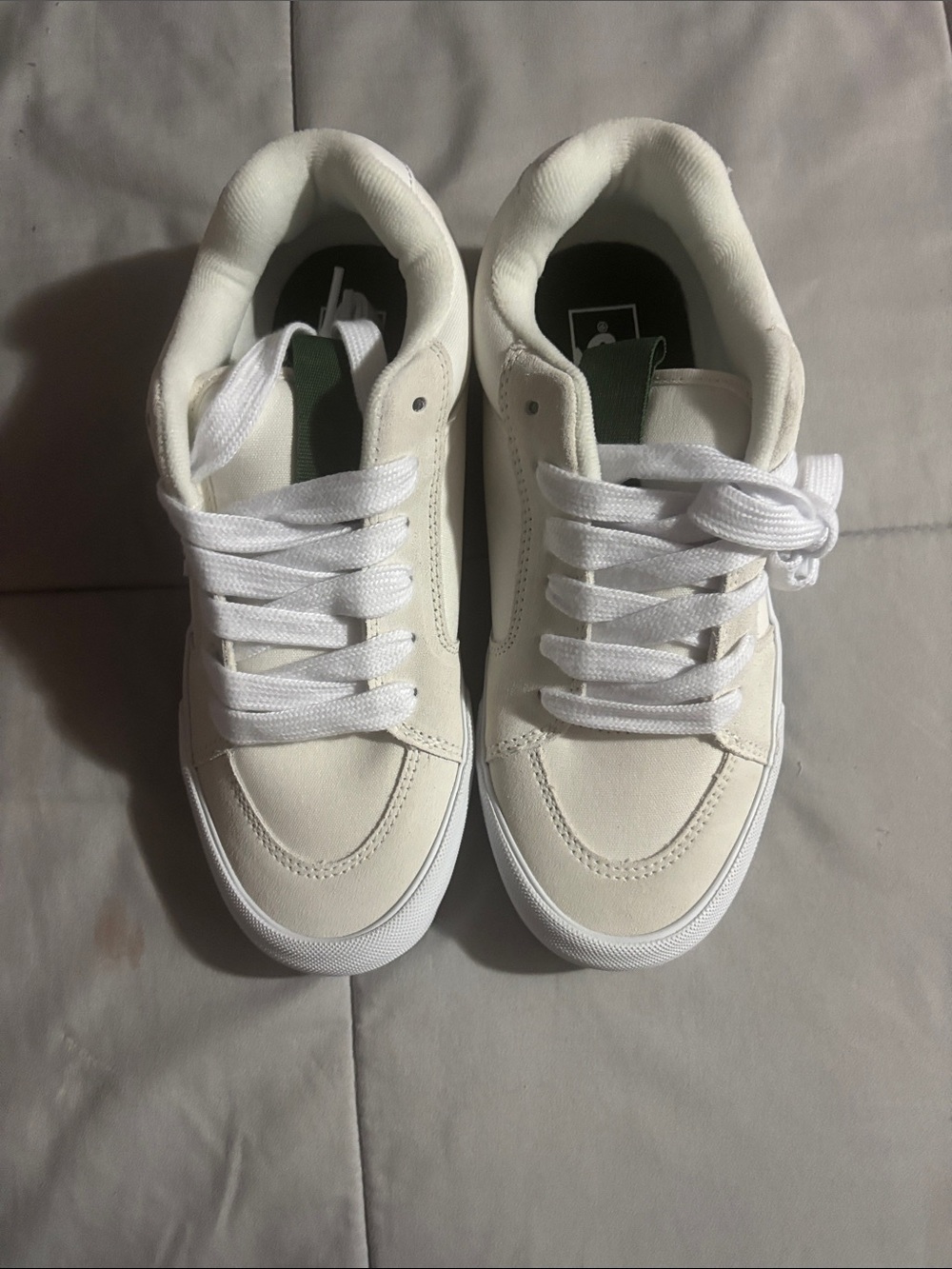Vans White Low-Top Sneakers with Green Tongue Tab